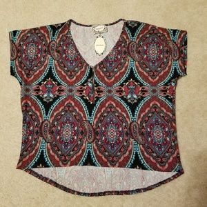 Skonhet mid zip up highlow blouse